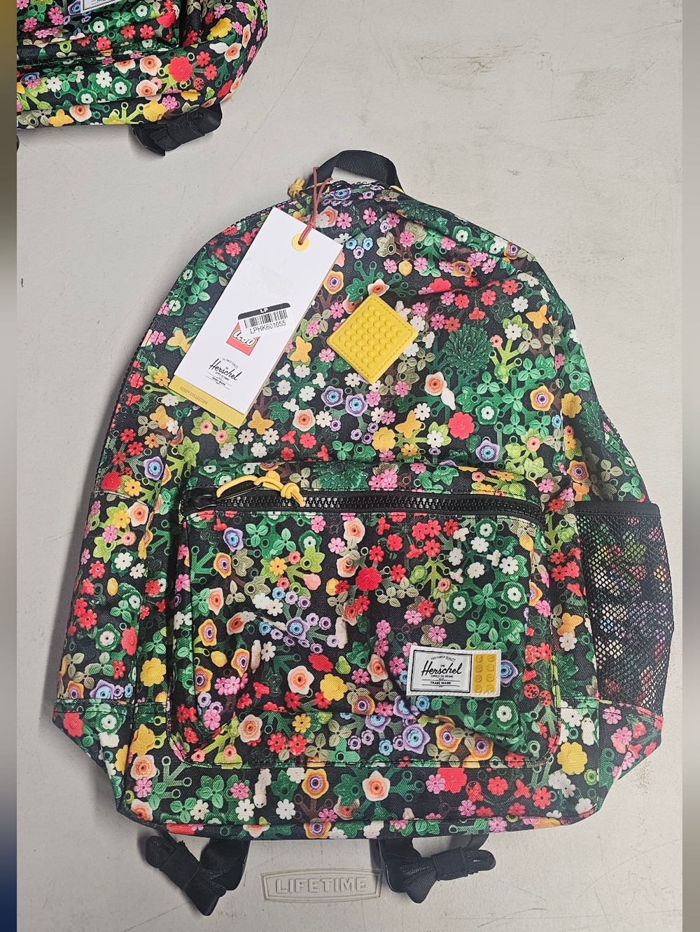 Herschel Lego Floral Print Backpack in Black with Multicolor Flowers